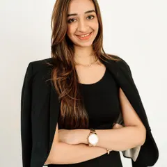 This pose with crossed arms conveys confidence and expertise. It's a timeless choice for a business portrait, perfect for authors, consultants, and executives looking for an image that says they are an expert in their field.