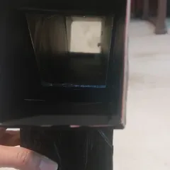 A view from inside the finished periscope. This shows the successful alignment of the mirrors, a key scientific principle the student learned while building her project.