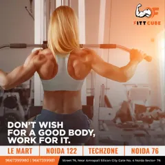 "Don't wish for a good body, work for it." A powerful reminder that results are earned. This image of a woman performing a lat pulldown inspires you to put in the effort.