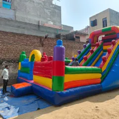 A large, multi-colored bouncy with various geometric shapes and arches. This abstract design is great for general-purpose use where a specific theme isn't needed.