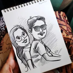 A fun couple caricature from my sketchbook. Capturing two people's personalities together in one drawing is always a joy.