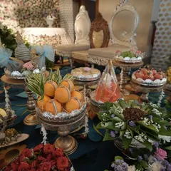 An assortment of beautifully arranged gift and sweet trays, adding to the festive and abundant feel of the celebration.