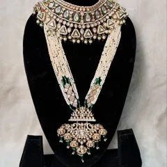 This is the full view of my rental set B-06. It includes the triangular polki choker and the stunning long pearl necklace with a heavy, traditional pendant.