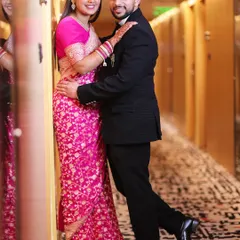 A classic, posed portrait of a couple. This static image shows my ability to capture timeless elegance in still photography as well as videography.