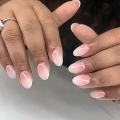 You can never go wrong with a classic ombré. I achieve this soft, blended look by carefully fading a milky white into a natural pink base for an effortlessly elegant manicure.