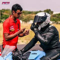 It’s all about you. Our programs feature a low student-to-instructor ratio, ensuring you get personalized feedback. Here, a coach provides one-on-one guidance on track positioning to help a rider improve their lines and build confidence.