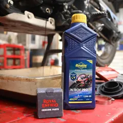 The right stuff for the job. Putoline N-TECH Pro R 15W-50 oil and a genuine Royal Enfield oil filter for a Himalayan service.