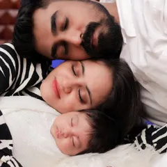 The quiet moments right after a baby arrives are my favorite. This peaceful portrait of a new family, all resting together, captures the incredible bond and love that fills the room. It’s a memory of pure serenity.