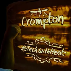 A close-up of the sand art created for Crompton, featuring their logo and campaign hashtag. I ensure that key branding elements are clearly and artistically represented in the final visuals.