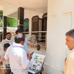 A close-up of our team demonstrating the electrical components of an automation system to an interested farmer. These detailed, one-on-one interactions during our Kisan Sabhas are crucial for building trust and ensuring clarity.