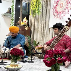 A moment of pure musical connection during a private baithak. Accompanying a sitarist in such a close setting allows for a deep, conversational performance where every note is felt.