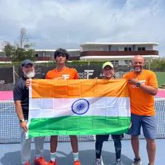 We bridge continents to build futures. Our players and coaches are seen here at our parent academy in Cap d'Agde, France, proudly holding the Indian flag. This international exposure is a key part of our program, offering invaluable experience against global talent.