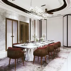 A dining room designed for abundance and connection. The spacious layout, luxurious marble table, and brilliant chandelier are not just aesthetic choices; they are Vastu elements intended to foster prosperity and harmonious family gatherings.