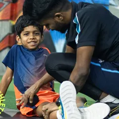 A crucial part of my coaching philosophy is connection. Here, one of my expert coaches works closely with a young athlete, ensuring he feels supported and understood. This personal guidance helps build confidence and makes the hard work of training an enjoyable process.