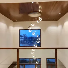 A full view of the spiral chandelier in its double-height setting.