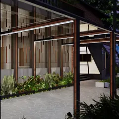 The evening view of this modern residence highlights the interplay of light and material. The metal framework and vertical louvers create a rhythmic pattern, while landscape lighting enhances the connection between the architecture and its garden.