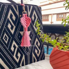 Share the love with a handmade macrame heart keychain. This is a perfect little gift for a friend or a sweet party favor for a bachelorette or bridesmaid hamper.