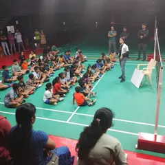 Speaking to young athletes and their parents about the importance of proper training techniques for long-term athletic development.