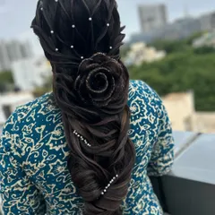 One of my signature styles, the 3D rose braid. This is an advanced technique that I teach in my pro courses, perfect for creating a show-stopping look for your portfolio.