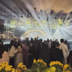 A wide shot showing the scale of the fort wedding. The combination of sunflowers, hanging lights, and powerful beams made for a breathtaking scene.