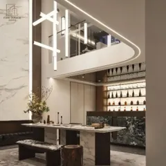 I design spaces that feel both grand and inviting. This interior render shows a double-height dining area with a marble table, complemented by a custom bar and a striking modern chandelier, demonstrating my approach to integrated interior architecture.