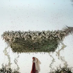 We had the honor of planning the big day for elite numerologist Aneesh Jumaani. This shot of them hugging under the floating mandap in Goa was straight out of a movie.