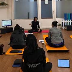 The theory behind the movement is just as important as the practice. I lead a classroom session during the Mat Pilates course, breaking down complex concepts into easy-to-understand principles.