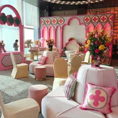The stunning decor at a Mehendi function where I was personalizing luggage tags. My floral-shaped tags complemented the beautiful pink and floral theme of the event perfectly.