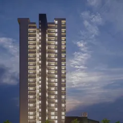 The 29-storey tower illuminated at dusk, highlighting its verticality and presence in the city skyline. The design carefully considers the building's nighttime appearance, contributing to the urban fabric even after dark.