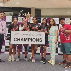 Our champion women's team celebrating their victory at the Seawoods Nexus mall event. Their skill and teamwork were on full display throughout the tournament.