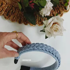 A finished custom macrame hairband in a lovely denim blue. This four-strand braid pattern is a bestseller and can be customized in any color you like. It makes a wonderful handmade gift.