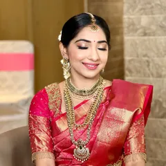 A close-up of the bride's radiant makeup. I focus on creating a smooth, long-lasting base that glows under the lights, ensuring she looks perfect throughout her wedding day.