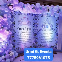 A unique take on a princess party with a giant, open storybook backdrop. The pages tell the birthday girl's own "once upon a time" story, framed by a beautiful lavender and white balloon arch.