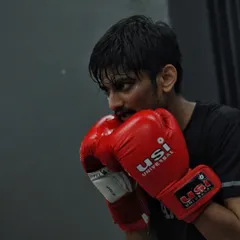 A close up of a fighter's stance and guard. We are obsessed with getting the fundamentals right.