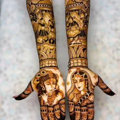 For a touch of divine love, I can create beautiful portraits like these of Radha and Krishna. This design is perfect for brides who want to incorporate spiritual and artistic elements into their mehendi.