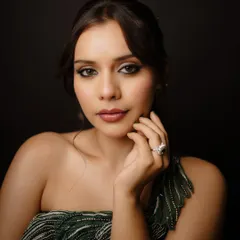 Serving glam for the win! This look is all about drama and elegance, perfect for a cocktail party or reception. We paired a sharp winged liner and a smokey eye with a flawless, dewy base to create this stunning, high-impact look.