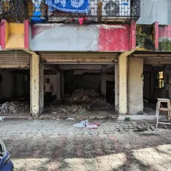 Before the transformation. The original site consisted of several shuttered storefronts, presenting a blank canvas for us to reimagine a unified and interactive facade that engages with the street.