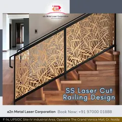 This stainless steel laser cut railing adds a layer of artistry to a functional staircase. The clean, nature-inspired pattern is precisely cut to create a play of light and shadow, offering both safety and a modern aesthetic that complements the wooden stairs.