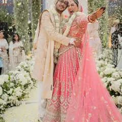 Pure, unadulterated joy. The smiles, the laughter, the shower of petals. This is why I do what I do.