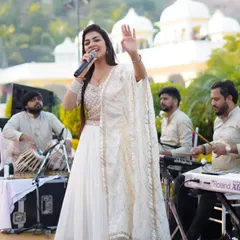 This is my happy place, on stage with my incredible band. We believe in the magic of 100% live music, with tabla, keyboard, and dholak creating a sound that connects directly with the heart. This was during a beautiful Haldi ceremony in Udaipur.