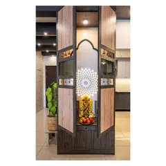A closer view of the exquisite puja unit, where spirituality meets sophistication. The backlit mandala and traditional bells create a space that honors tradition while embracing modern style.