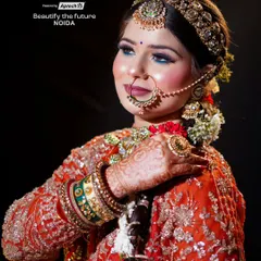 This contemporary bridal look in orange shows a modern approach to wedding makeup. We train our students in creating soft glam looks with a focus on glowing skin and defined eyes, perfect for the new-age bride.