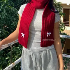 I love bringing custom ideas to life, like this anime-inspired Mikasa scarf. This piece shows the detailed ribbing and delicate bow accent, perfect for businesses looking for unique, themed apparel for their customers.
