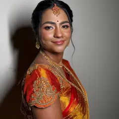 The joy of a bride on her special day is my greatest inspiration. For this traditional South Indian ceremony, I created a warm, glowing look with a dewy base and defined eyes to complement her vibrant Kanjeevaram saree and temple jewellery.