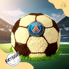 A winning cake for a PSG fan. This 3D football cake is meticulously decorated with buttercream to resemble a soccer ball, complete with the Paris Saint-Germain logo.