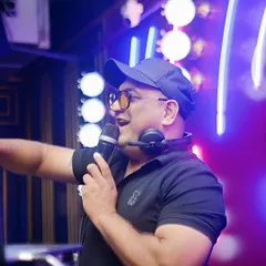 A huge part of my performance is connecting directly with the audience. I don't just play tracks; I get on the mic to hype the crowd, guide the energy, and make sure everyone feels like part of the show. This is how we build a vibe together.