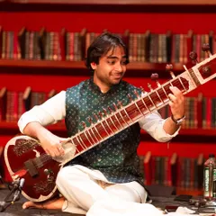 A moment of joy during a performance with my band at a beautiful venue in Bangalore. I love connecting with the audience through my music, whether it's a soulful raag or an energetic fusion piece.