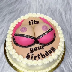 Just another fun and slightly awkward day at the bakery. This "Tits your birthday" cake is a popular request for bachelorette parties and birthdays with a sense of humor. It's all about celebrating with a laugh.