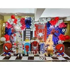 Time to be a hero! I bring the action with this dynamic Spiderman-themed party, complete with a city skyline backdrop, character cutouts, and a classic red, white, and blue balloon arch. It's a setup guaranteed to make your little one's spidey senses tingle.