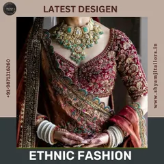 A close-up of a heavily embroidered bridal blouse and lehenga set. We pay close attention to the fine details, from the zari work to the stone embellishments, for your wedding day.